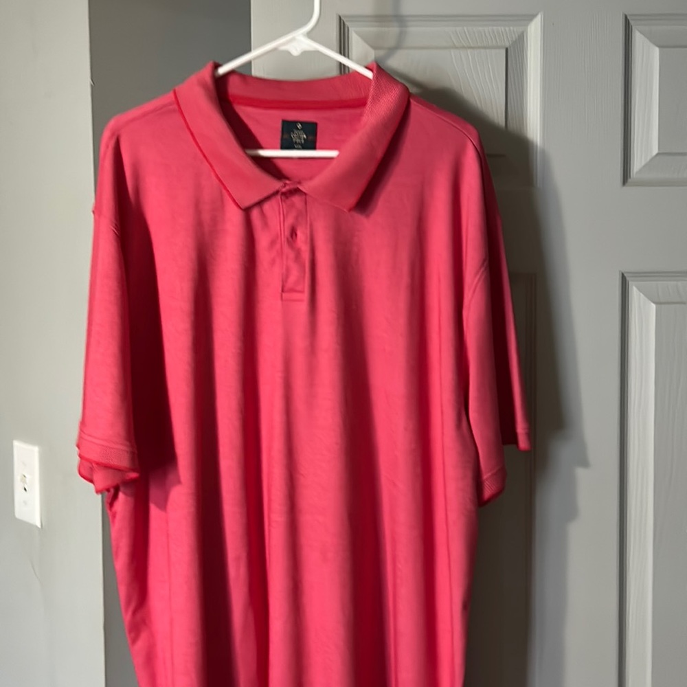 Coral pink golf shirt